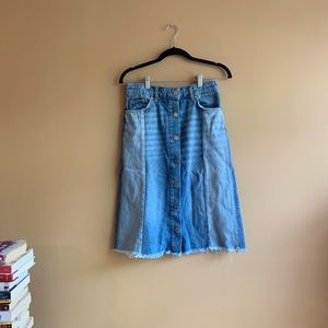 Two-toned denim skirt with frayed bottom.